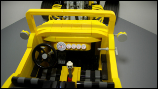 Illustration for article titled More LEGO madness... AFOL designs/builds coolest hot-rod yet...